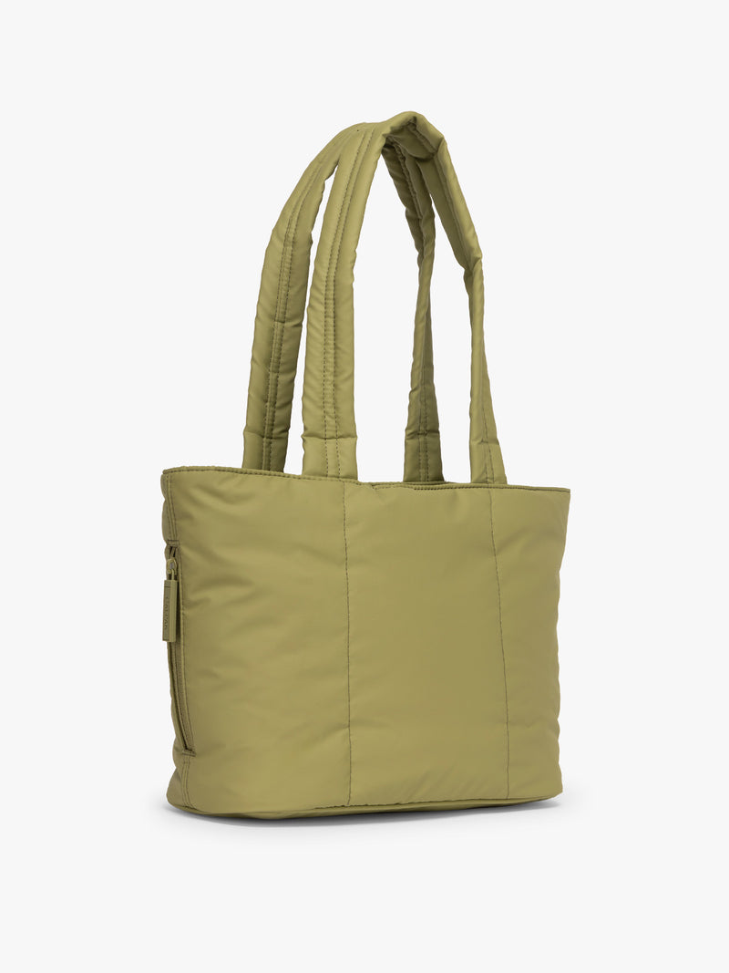 Side view of CALPAK Luka Mini Tote in green Pistachio on a white background