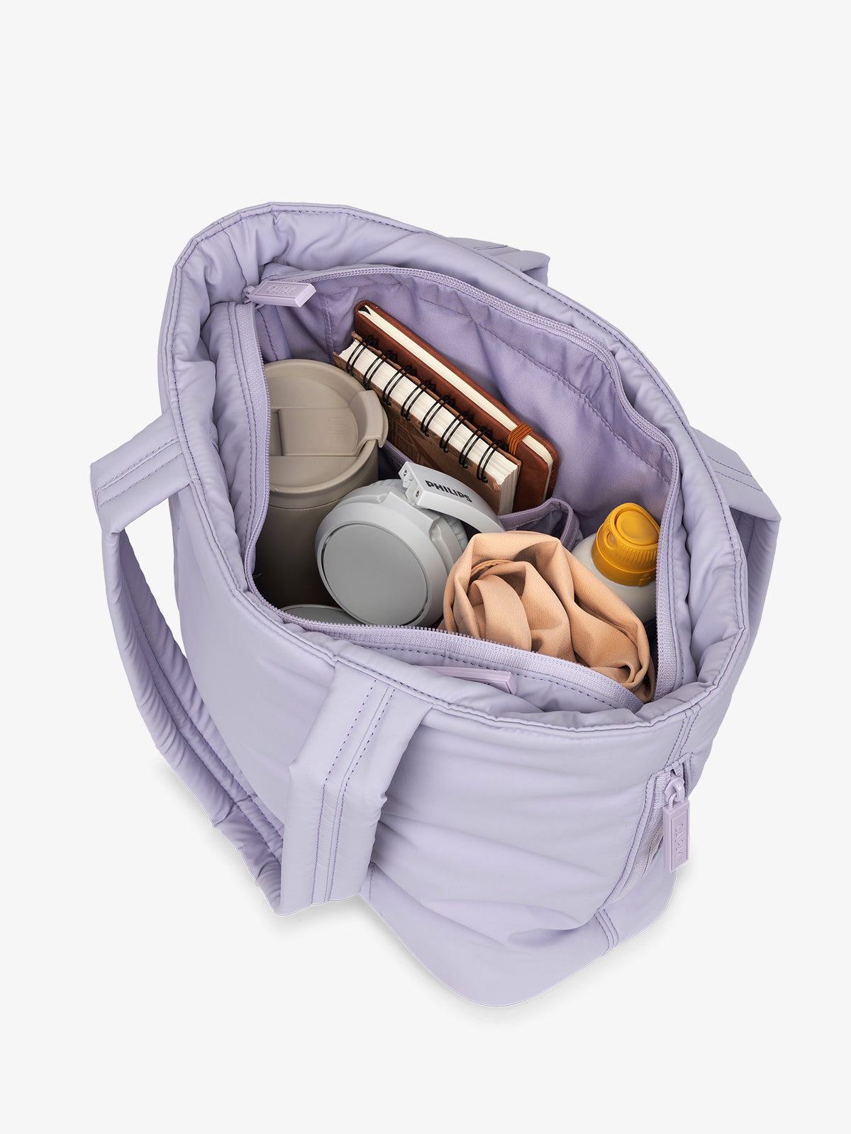 CALPAK Luka Mini Tote top view and opened with items inside in purple lavender in Orchid; ALM2401-ORCHID