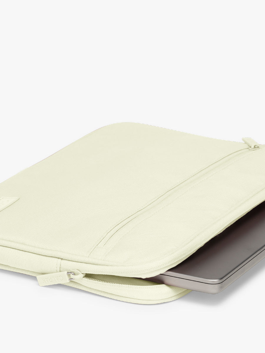 Laptop in the CALPAK Padded Laptop Sleeve 13-14" in light green Celadon; ALP2213-CELADON