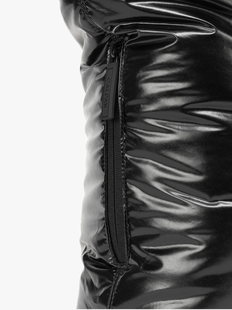 Side zipper of CALPAK Luka Expandable Tote in Glazed Black