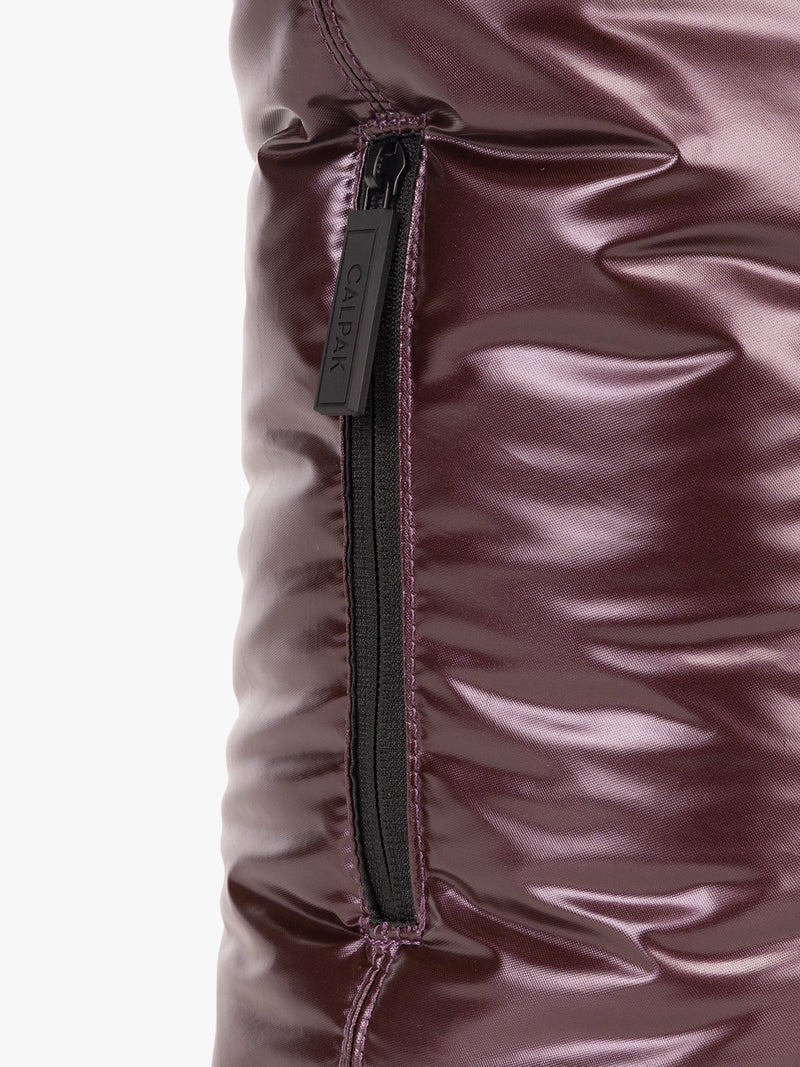 Side pocket zoom of CALPAK Luka Expandable Tote in maroon Dark Cherry