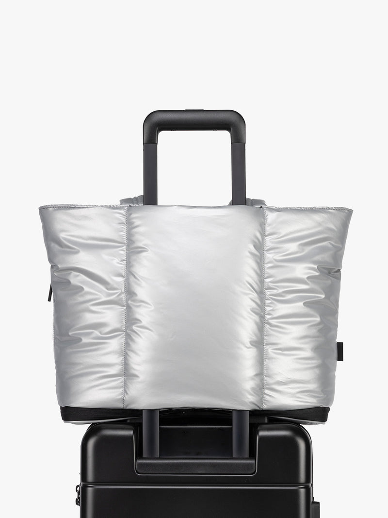 Trolley sleeve of CALPAK Luka Expandable Tote in Silver