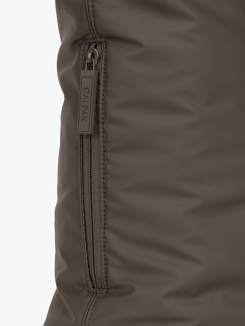 Side pocket of CALPAK Luka Expandable Tote in brown Mushroom