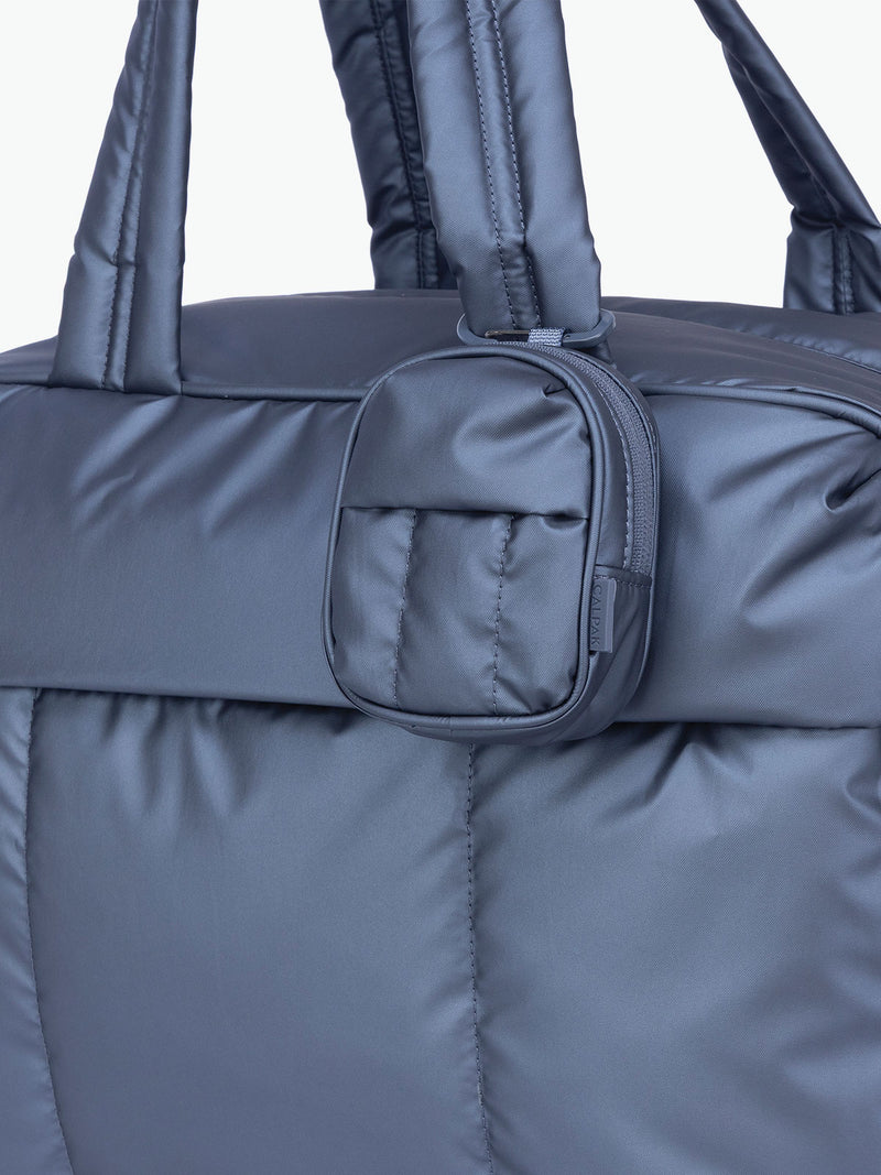 CALPAK Luka Backpack Zip Bag Charm in metallic dark blue Metallic Indigo clipped on bag