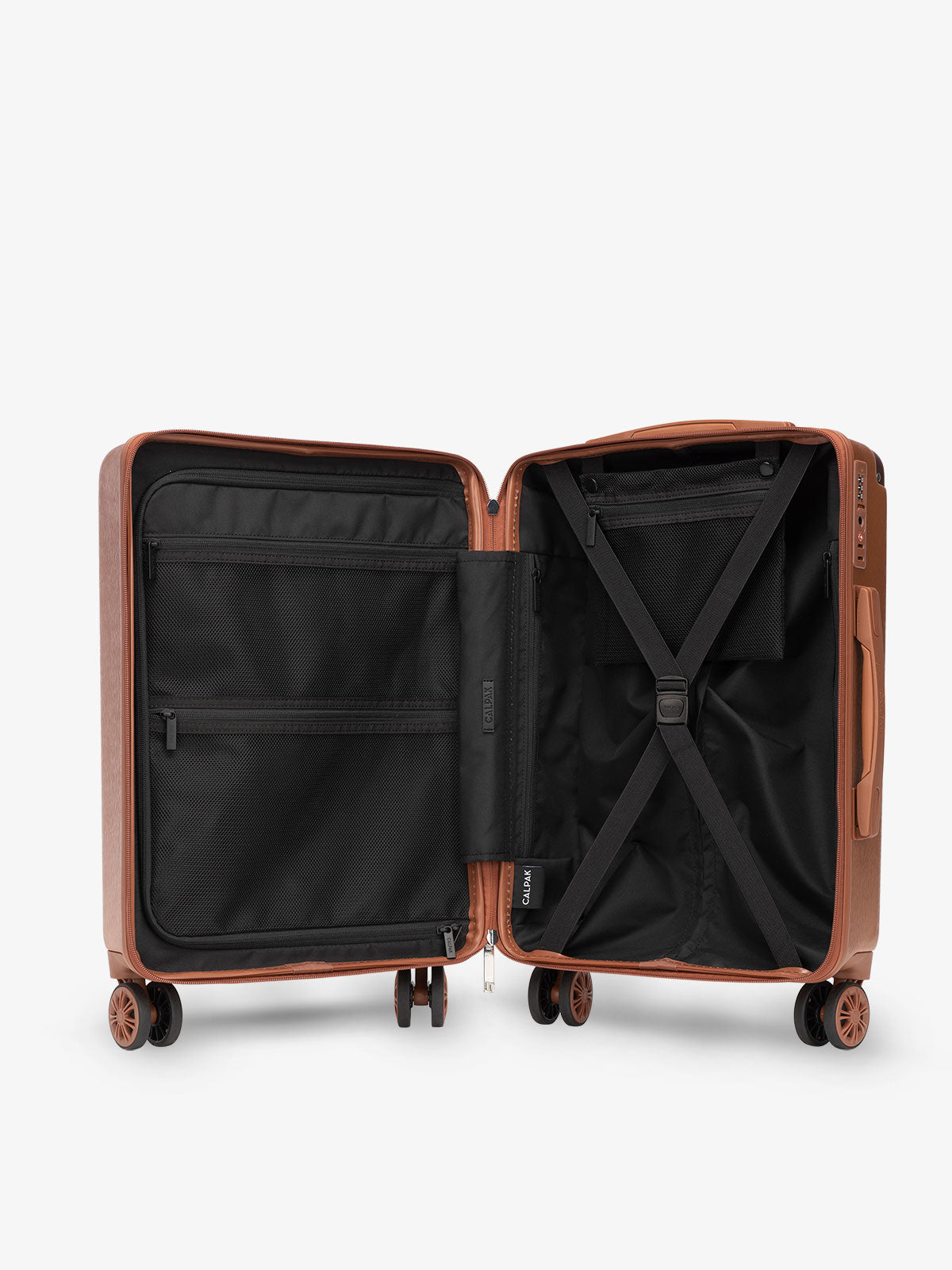 CALPAK Ambeur carry-on interior featuring multiple compartments and compression strap in copper