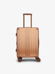 Front-facing image of CALPAK Ambeur carry-on luggage with 360 spinner wheels in copper; LAM1020-COPPER