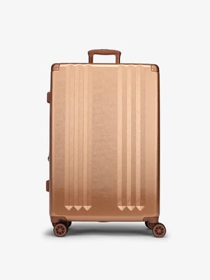 CALPAK Ambeur large 30 inch hardshell luggage featuring 360 spinner wheels in copper; LAM1028-COPPER