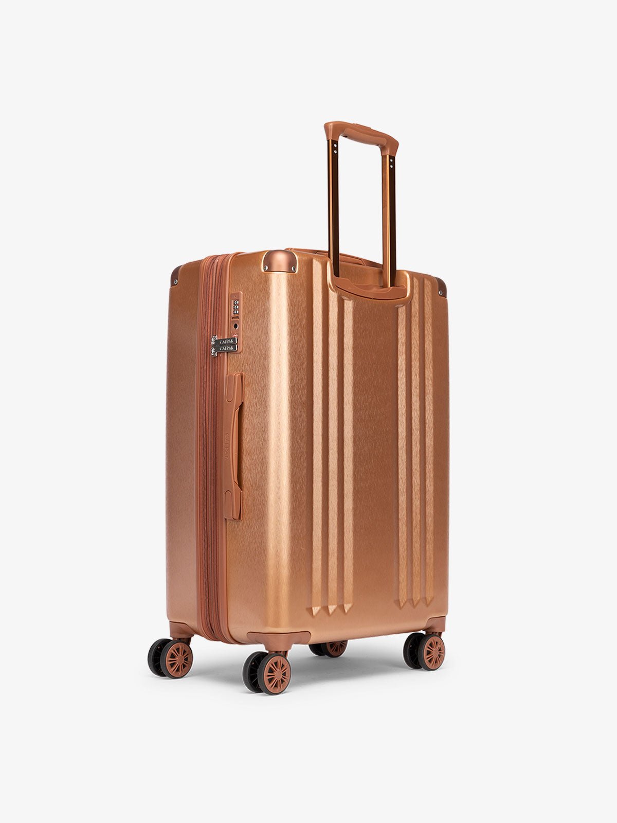 CALPAK Ambeur medium 26 inch hard shell rolling suitcase in copper