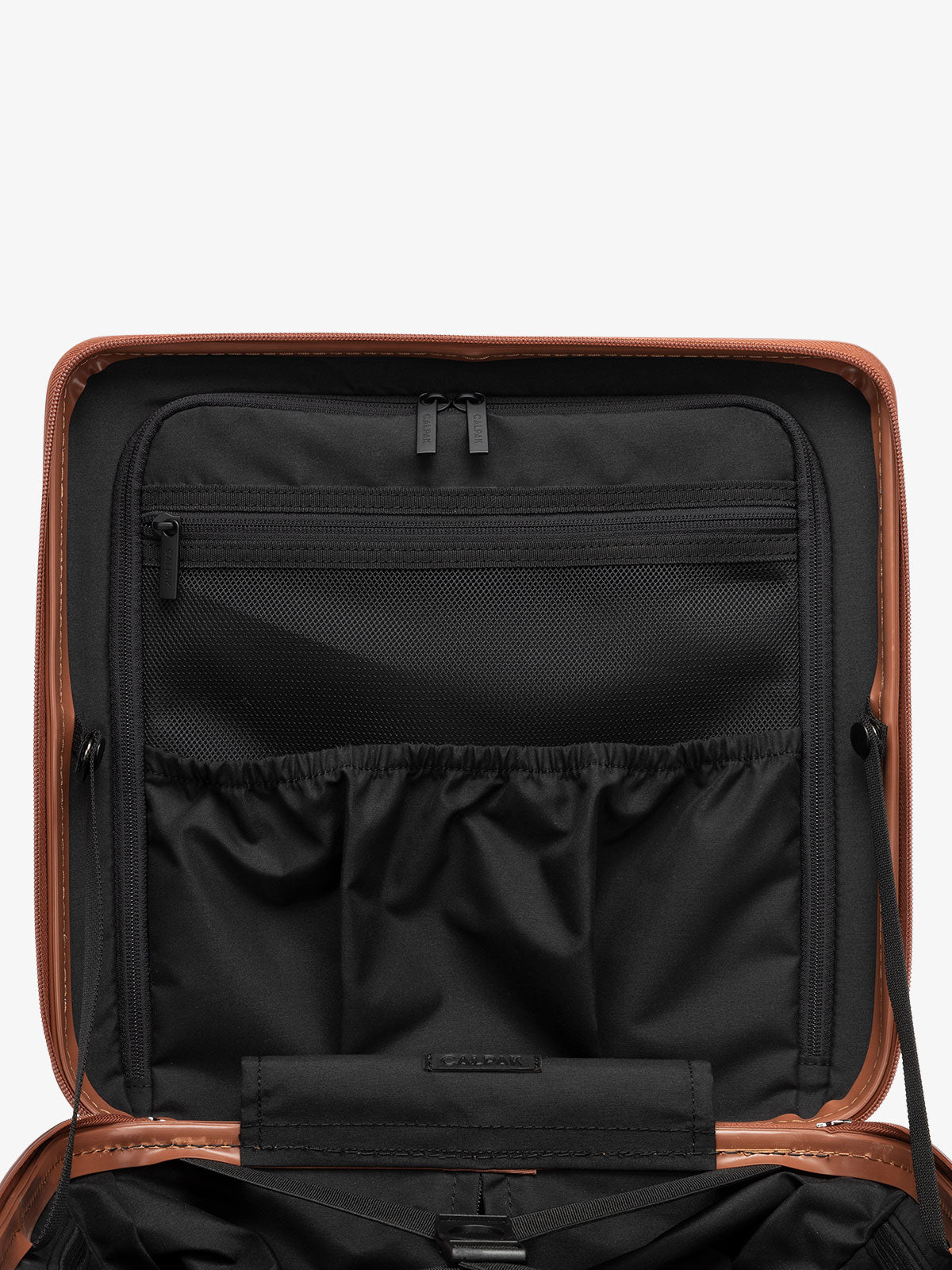 CALPAK Ambuer small wheeled carry on with multiple interior pockets and compression straps in brown copper; LAM1014-COPPER