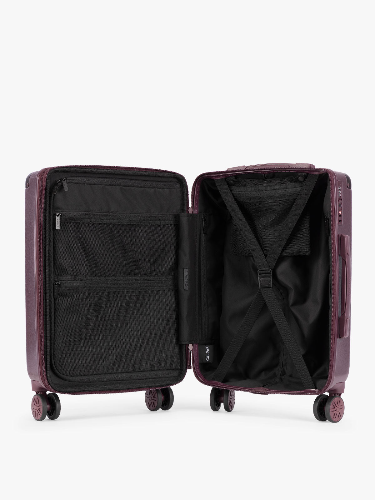 Opened view of CALPAK Ambeur Three-Piece Set in dark burgundy Dark Cherry, featuring different sizes with telescoping handles extended, set against a plain light gray background; LAM3000-DARK-CHERRY