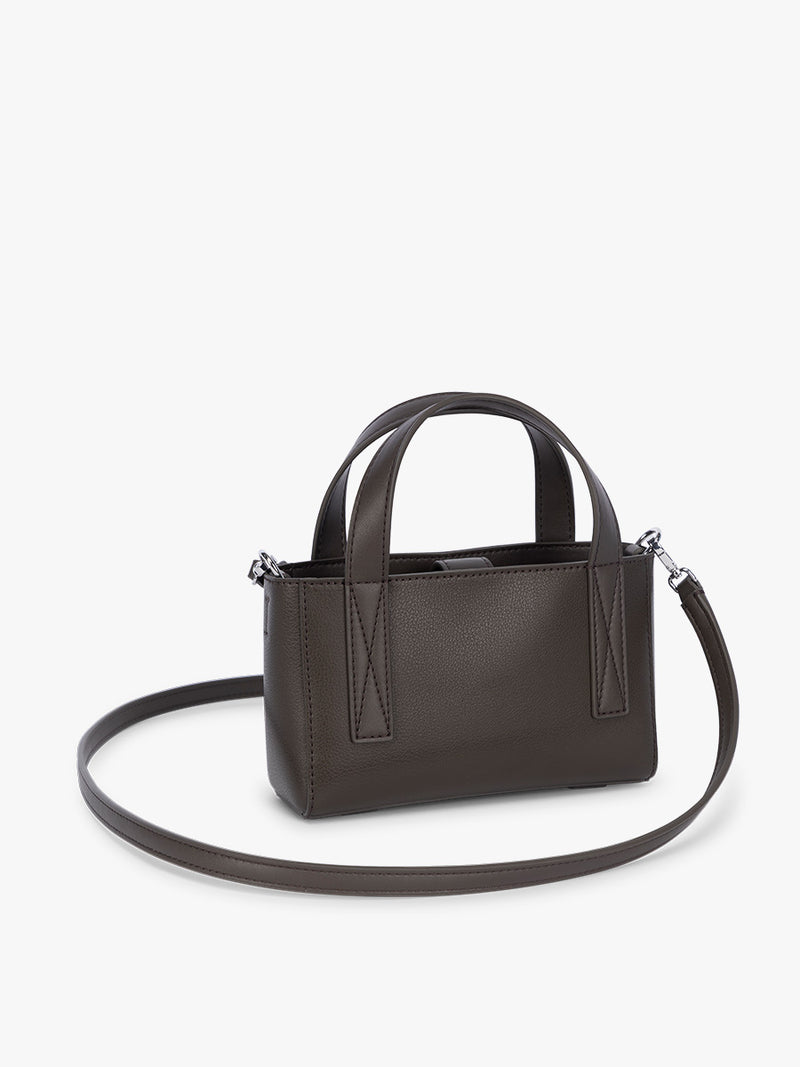 Side view of CALPAK Haven Mini Crossbody Bag in dark brown Mushroom