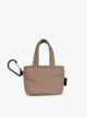 CALPAK Luka Tote Zip Bag Charm in light brown Chocolate with carabiner on a white background; AMT2601-CHOCOLATE