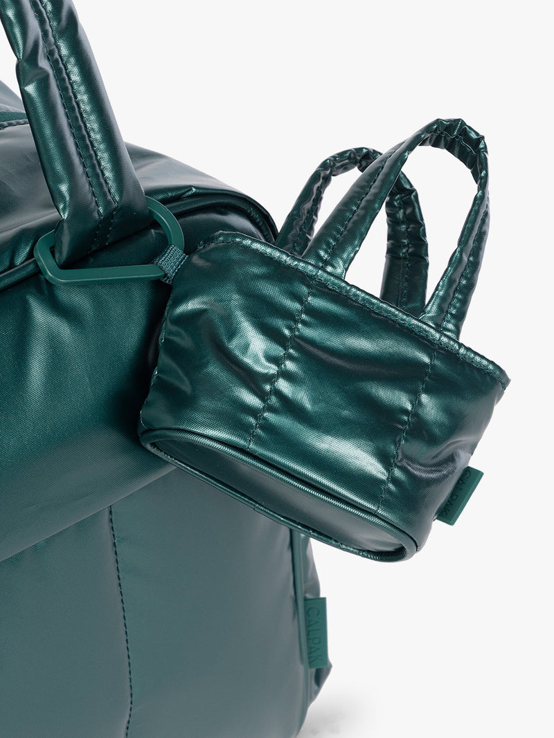 CALPAK Luka Tote Zip Bag Charm in dark green shiny Glazed Kale clipped on bag