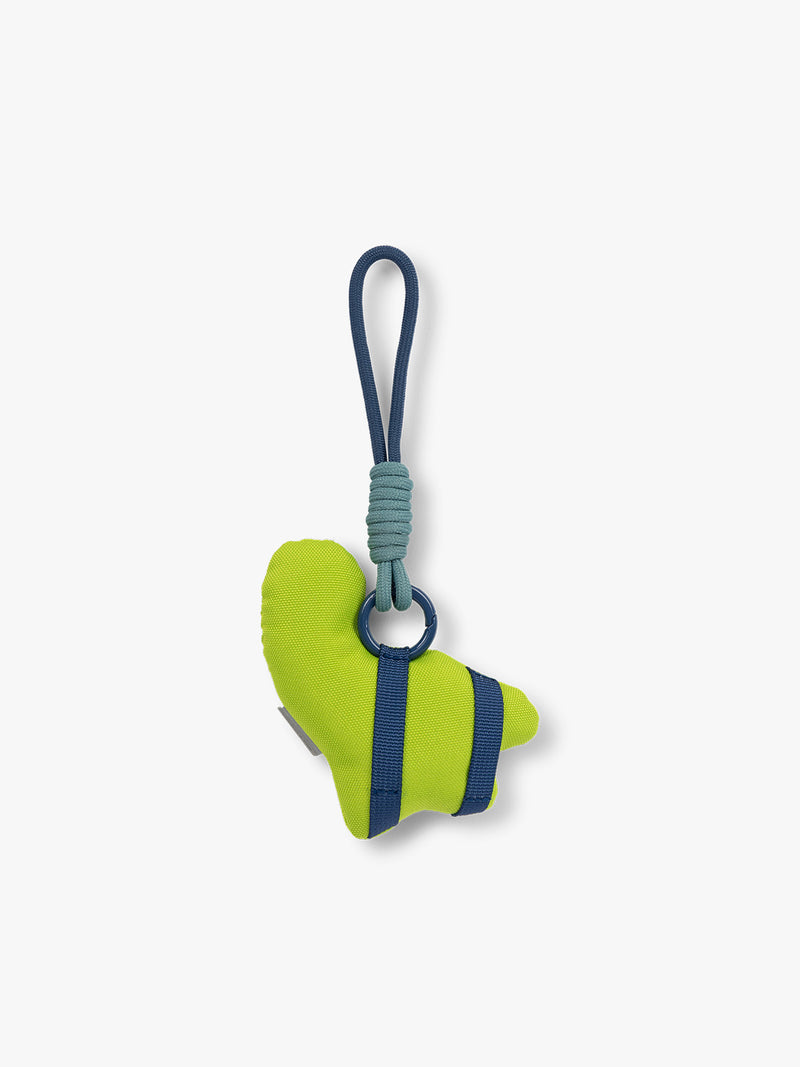 CALPAK Kids Pluffy Bag Charm blue Dinosaur on light green plush back view