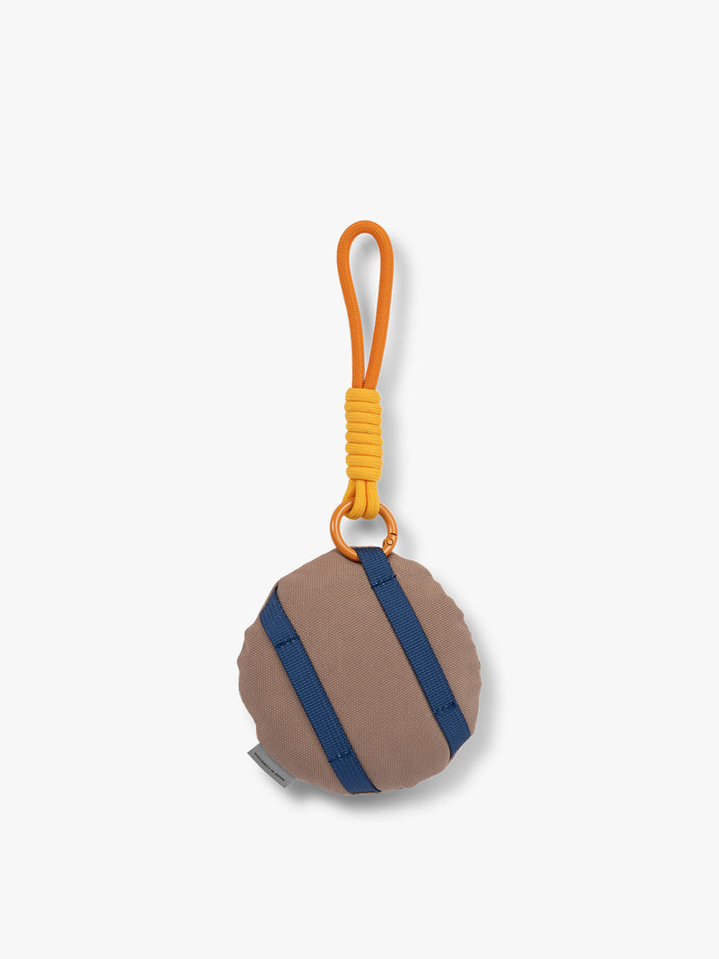 CALPAK Kids Pluffy Bag Charm white Donut with sprinkles on tan plush back view