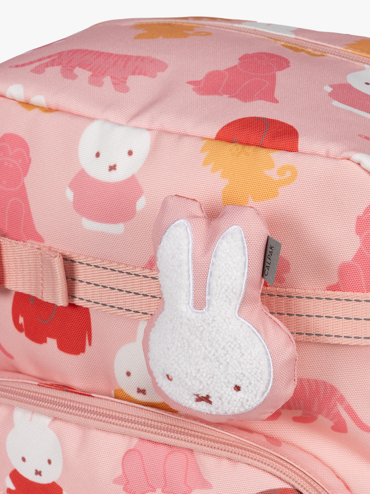 Colorful CALPAK + Miffy Kids Essentials Set with children's Large backpack, lunch bag , pencil case set on a white background with pink accents and Miffy with other animals; BCKL5000-MIFFY-PINK-ZOO-TRIP