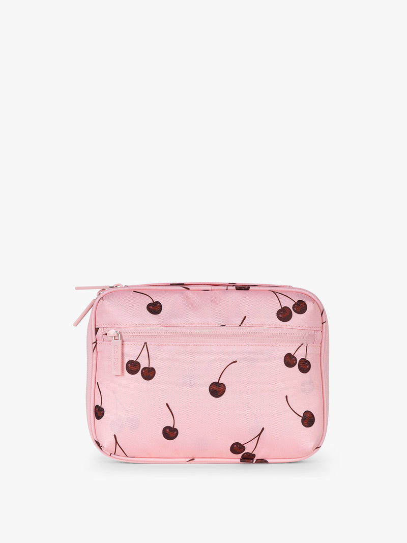 Back side of CALPAK Tech Organizer in pink with cherry print in Blossom Cherry