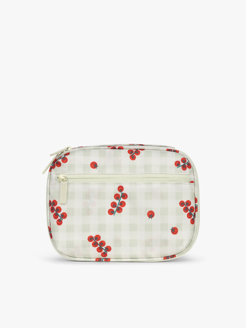 Backside of CALPAK Tech Organizer in green and white gingham print with tomato print