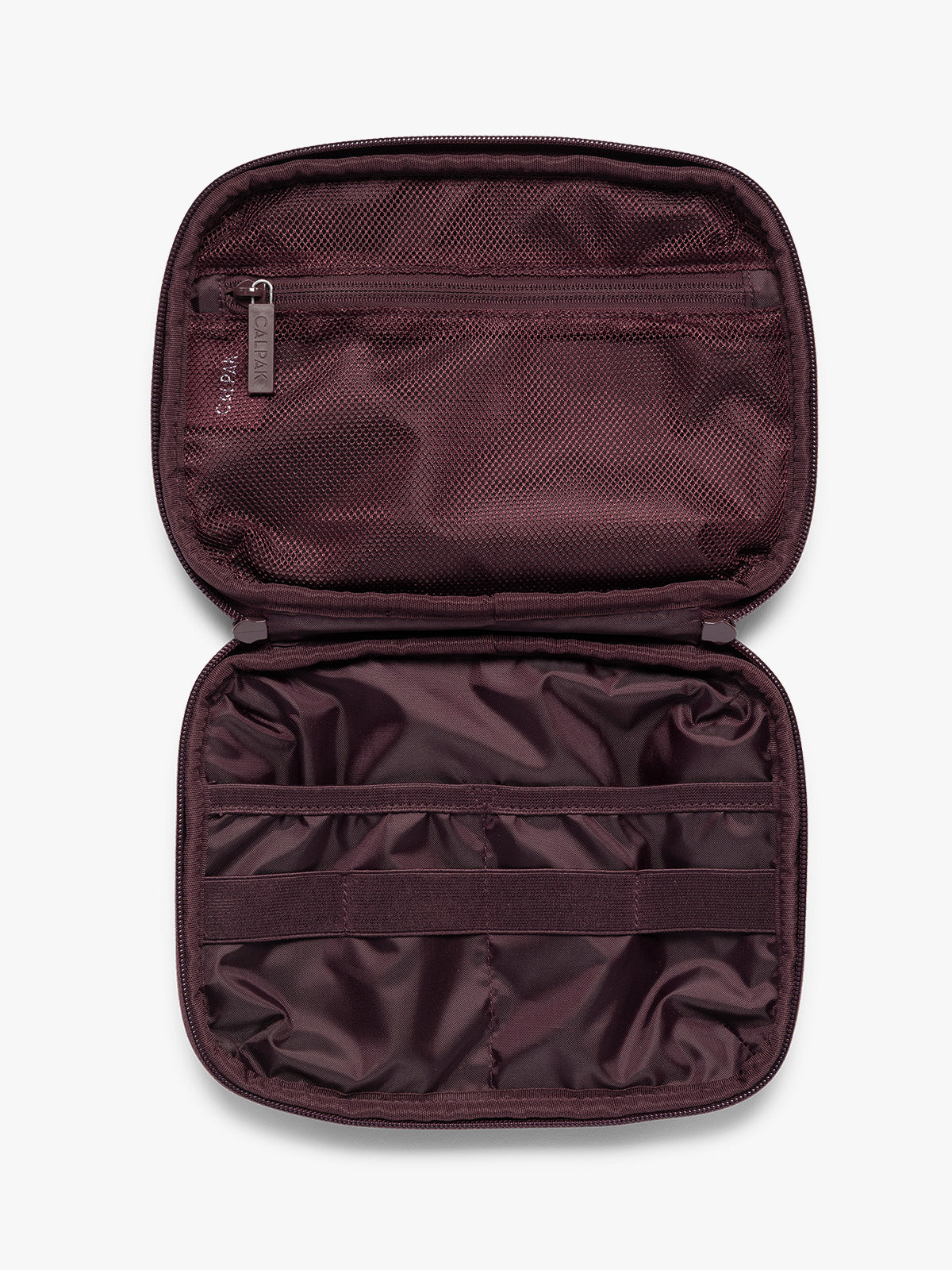Opened dark burgundy CALPAK Tech Organizer pouch with a top zipper, front zippered pocket, and a small silver metal brand zipper, shown against a plain white background; ATC2001-DARK-CHERRY
