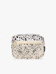 A rectangular CALPAK Tech Organizer pouch in Snow Leopard with a black and beige animal print Leopard pattern, featuring a cream-colored zipper and a small black brand tag on the right side; ATC2001-SNOW-LEOPARD