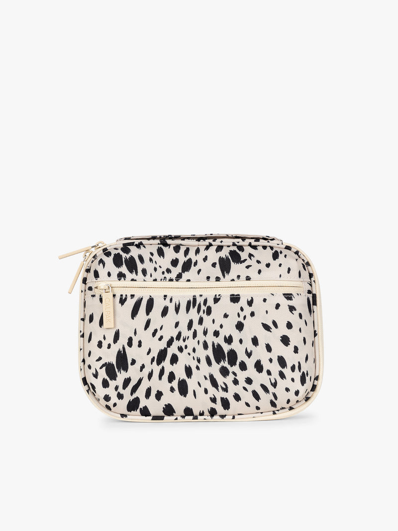 Backside of a rectangular CALPAK Tech Organizer pouch in Snow Leopard with a black and beige animal print Leopard pattern, featuring a cream-colored zipper and a small black brand tag on the right side