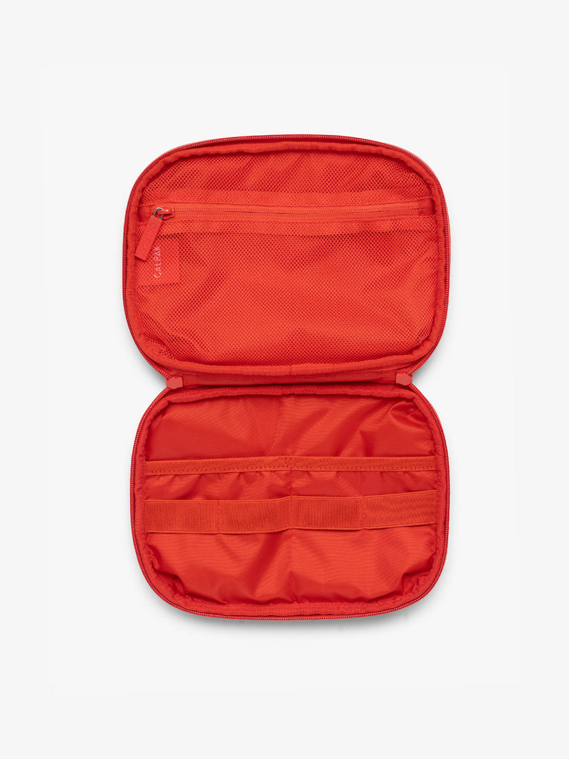 Opened view of CALPAK Tech Organizer in red Tomato