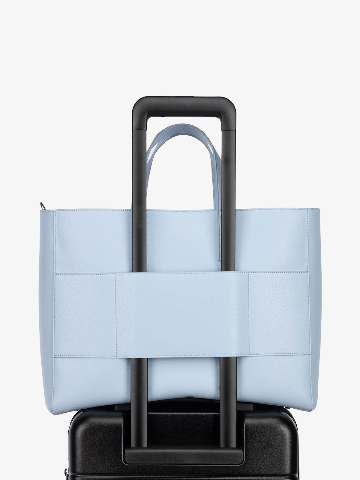 CALPAK Haven Laptop large tote bag with luggage sleeve for travel in light blue; ATO2101-HYDRANGEA