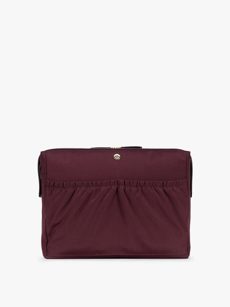 Laptop sleeve of CALPAK Haven 16" Laptop Tote in Dark Cherry deep red crocodile-embossed tote bag with top handles and a detachable shoulder strap, shown against a plain white background