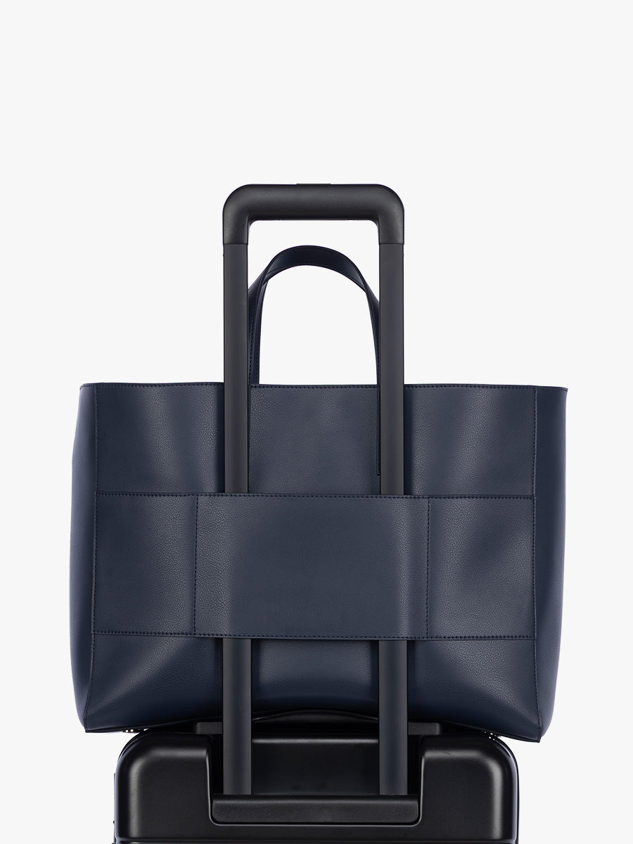 Trolley sleeve of CALPAK Haven 16" Laptop Tote in dark blue Navy; ATO2102-NAVY