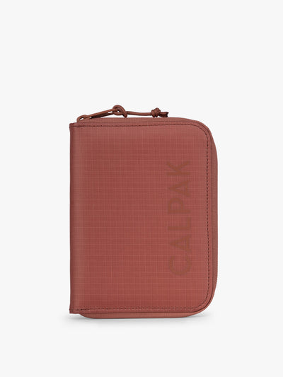 CALPAK Terra Zip Passport Wallet in red-orange Clay; ATPW2501-CLAY view 1