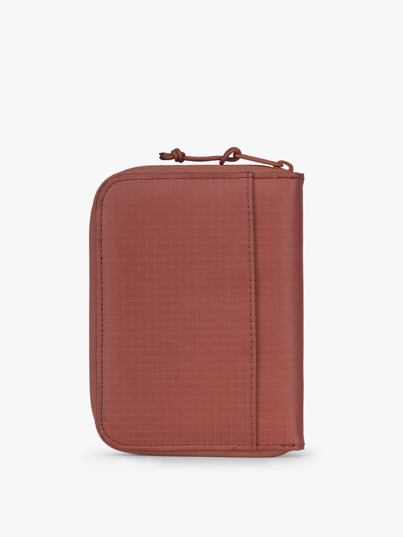 CALPAK Terra Zip Passport Wallet in red-orange Clay back