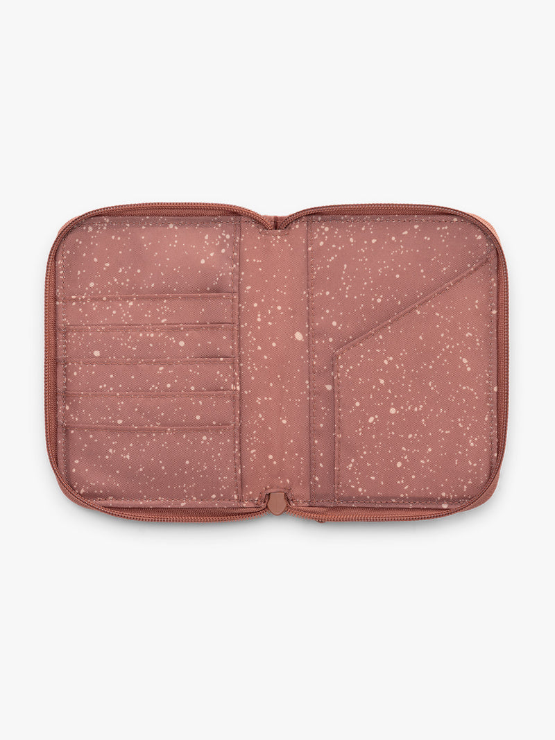 CALPAK Terra Zip Passport Wallet in red-orange Clay opened