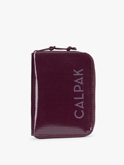  CALPAK Terra Zip Passport Wallet in dark red Dark Cherry on a white background; ATPW2501-DARK-CHERRY view 1
