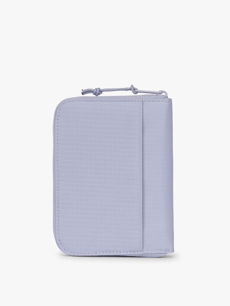 Backside of Front side of CALPAK Terra Zip Passport Wallet in light purple Sea Glass