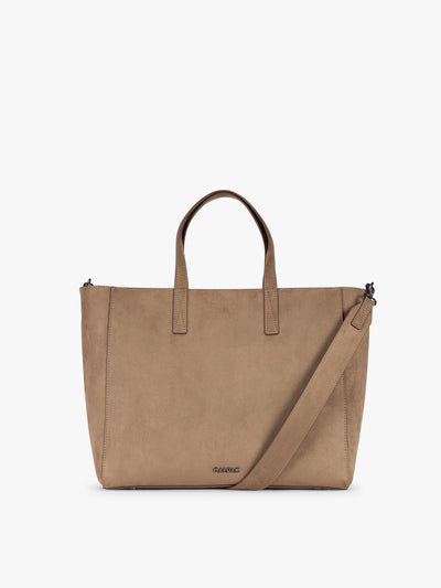 CALPAK Haven 15 Laptop Tote in Truffle Suede taupe with dual top handles and a matching shoulder strap against a plain white background; ATS2501-TRUFFLE-FAUX-SUEDE view 1