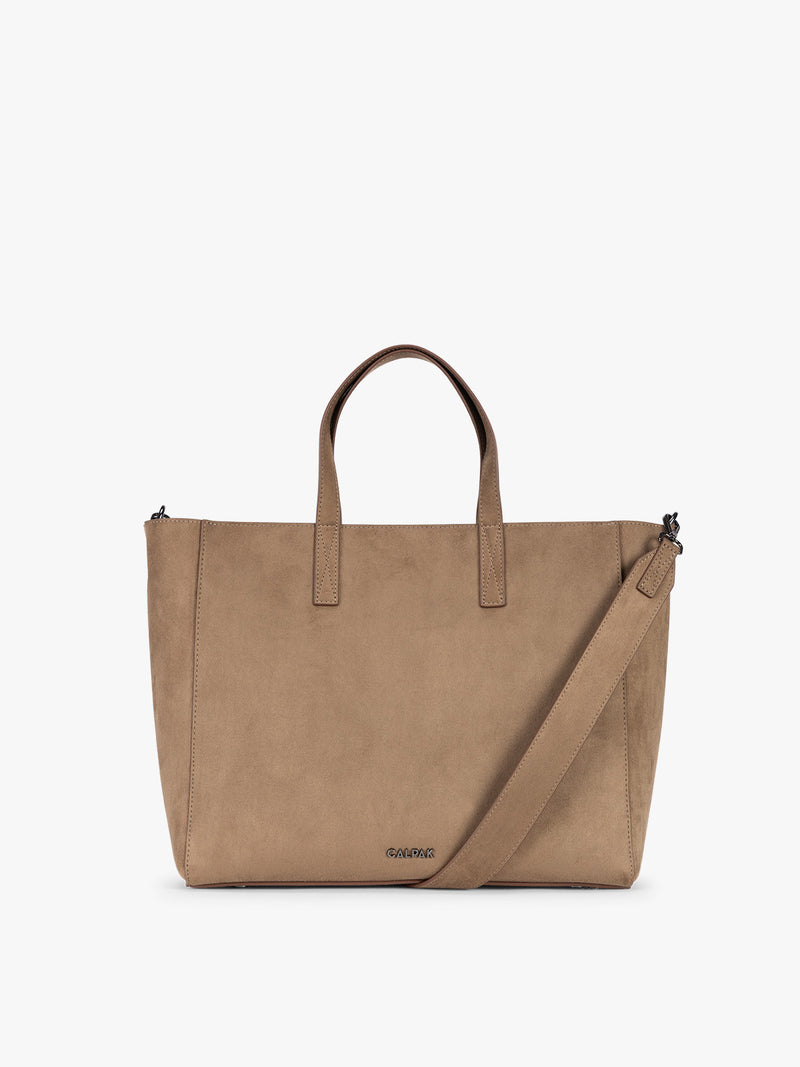 CALPAK Haven 15" Laptop Tote in Truffle Suede taupe with dual top handles and a matching shoulder strap against a plain white background