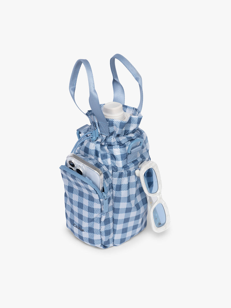 Items in the CALPAK Water Bottle Holder in blue and white checkered French Blue Gingham