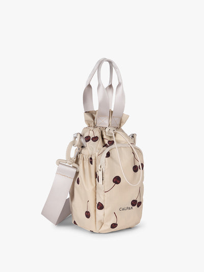 CALPAK Water Bottle Holder in Oatmeal Chery in beige with cherry pattern; AWH2101-OATMEAL-CHERRY view 1
