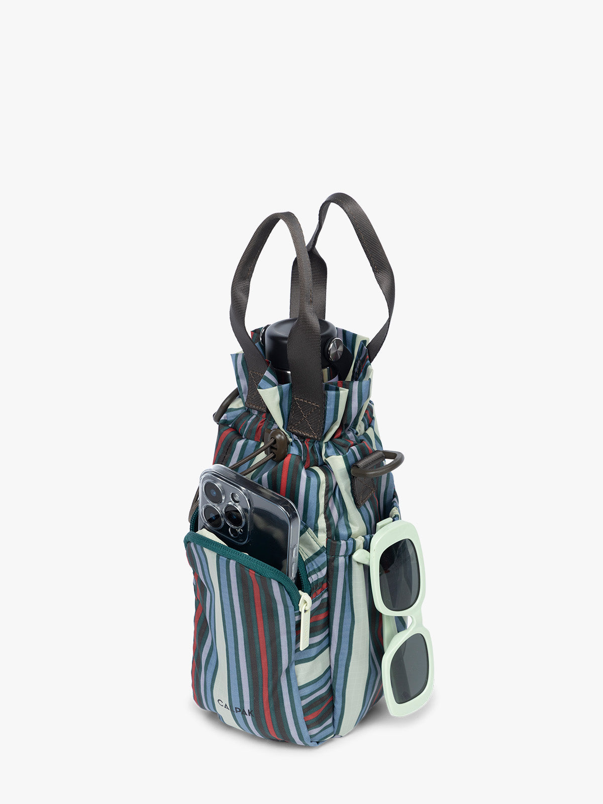 Items and water bottle in the CALPAK Water Bottle Holder in multicolor stripe Riviera Stripe; AWH2101-RIVIERA-STRIPE