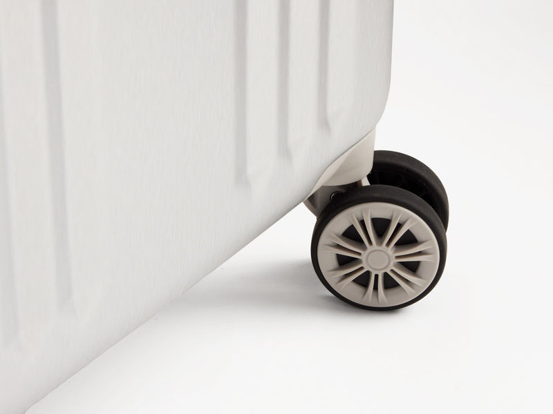Wheels of CALPAK Ambeur Collection luggage zoom shot