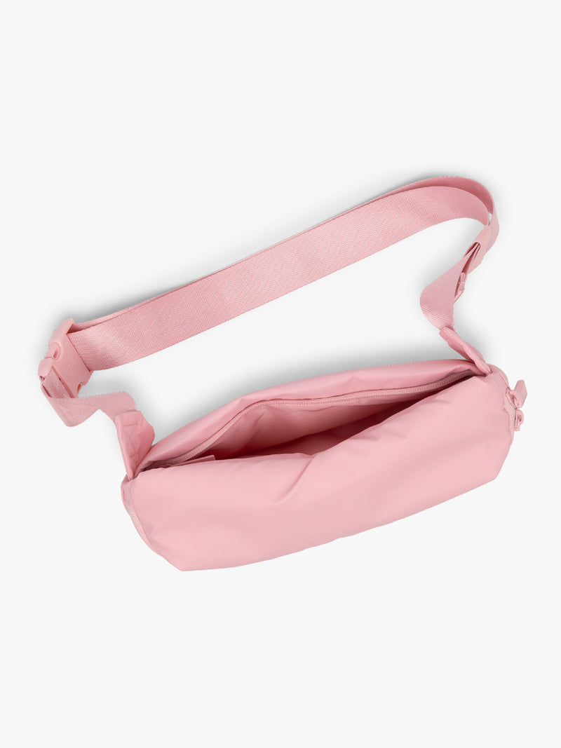 CALPAK Luka Belt Bag in pink Blossom top view with zipper opened