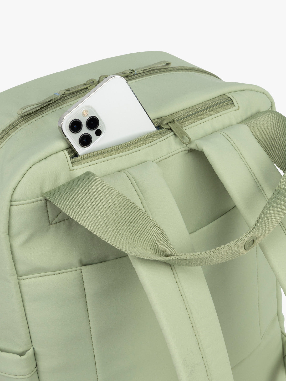 CALPAK Connect Laptop Backpack in light green Meadow front pocket on a white background; BCN2401-MEADOW