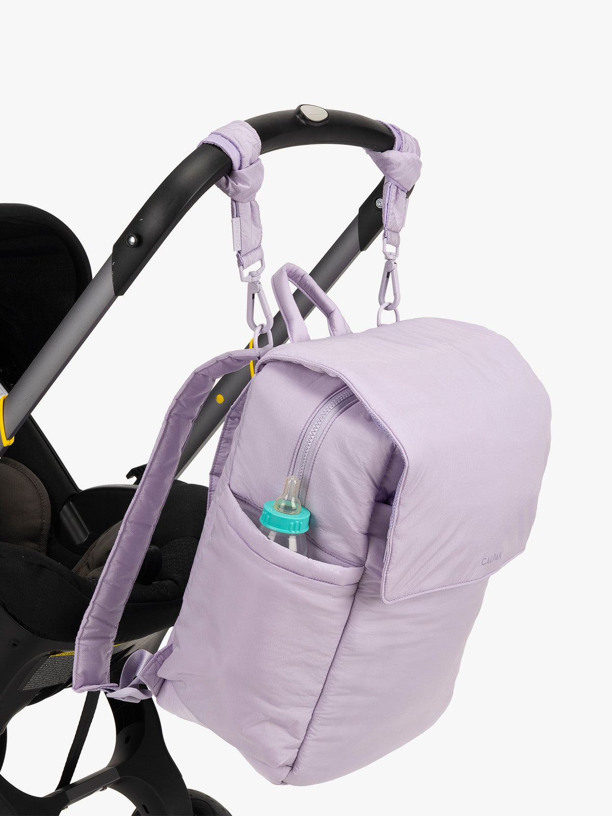 CALPAK Diaper Backpack in lavender purple Orchid hanging on stroller with stroller straps; BPB2401-ORCHID