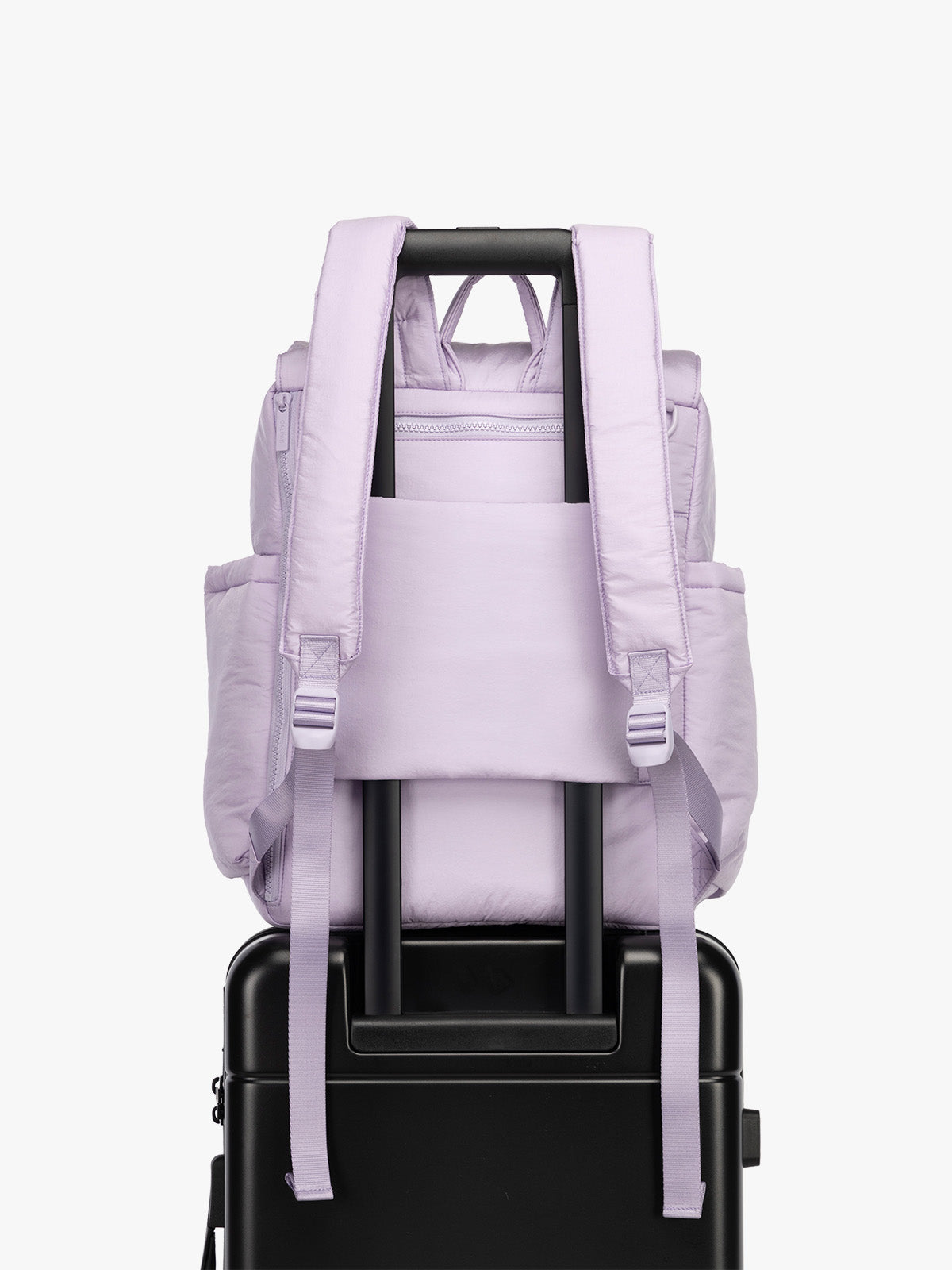 CALPAK Diaper Backpack in lavender purple Orchid on luggage with trolley sleeve; BPB2401-ORCHID