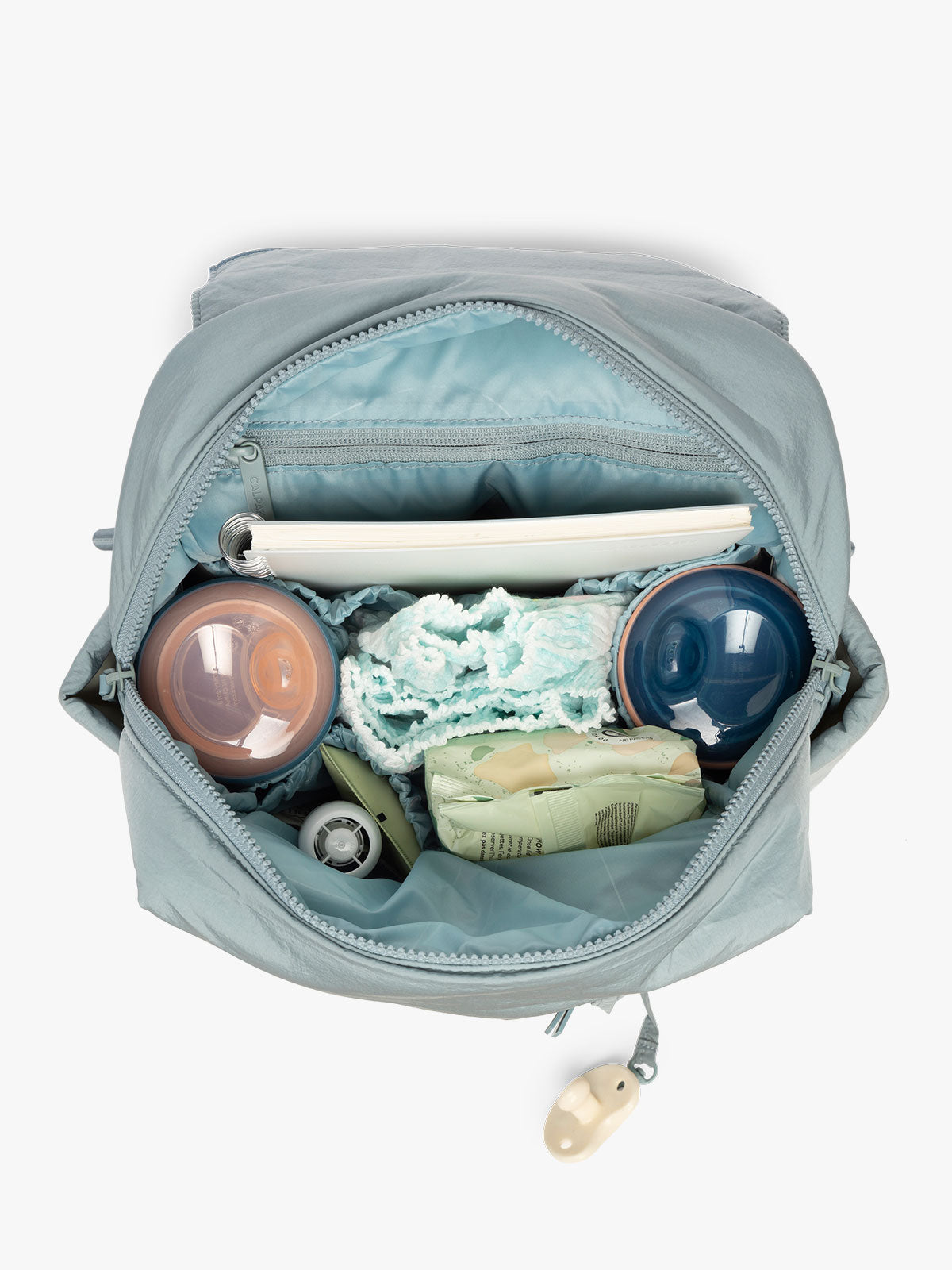CALPAK Convertible Mini Diaper Backpack in light blue Bluebell opened interior; BPC2401-BLUEBELL