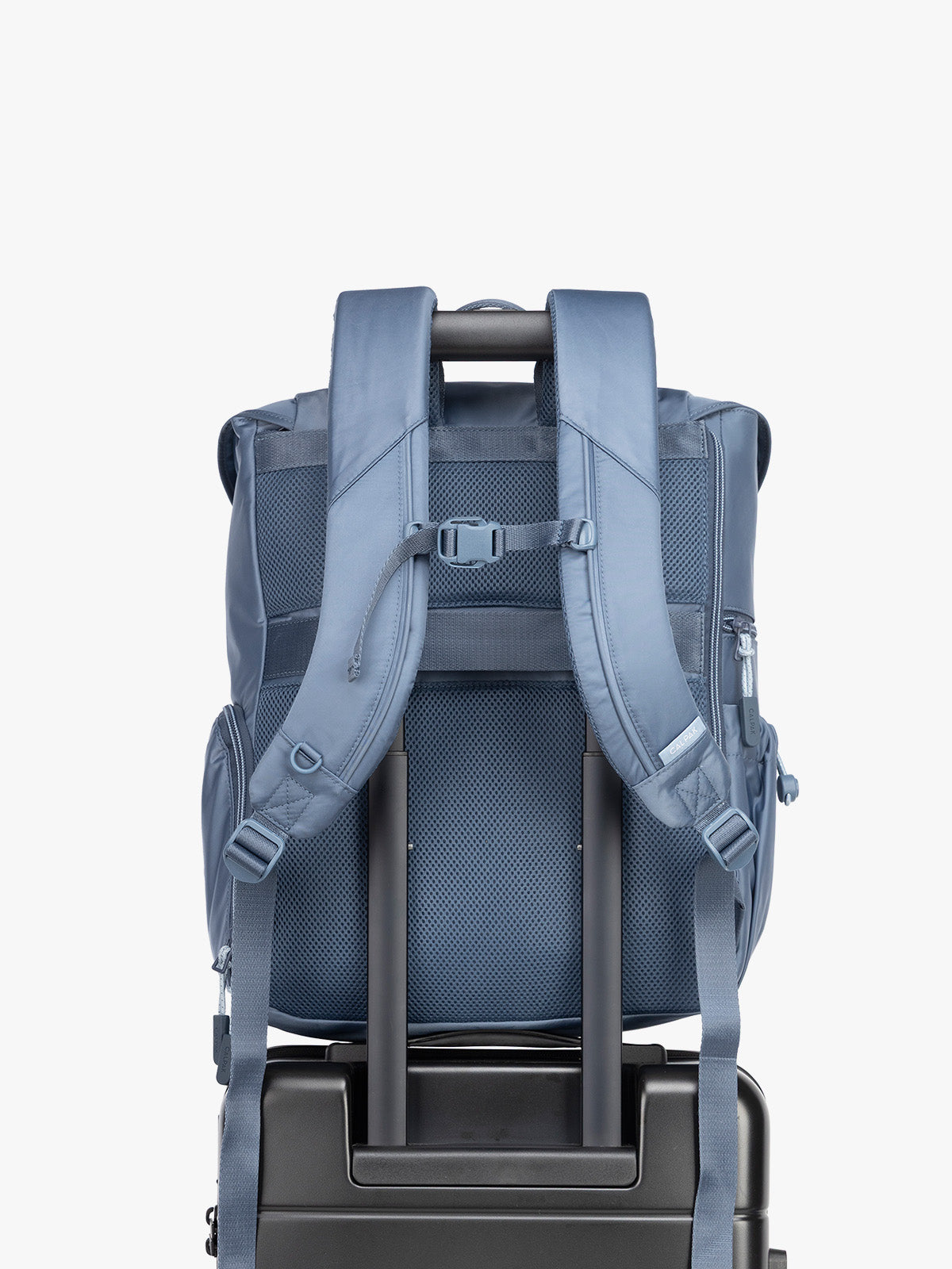 CALPAK Fit Gym Backpack in blue Indigo front view with trolley sleeve for luggage; BPF2601-INDIGO