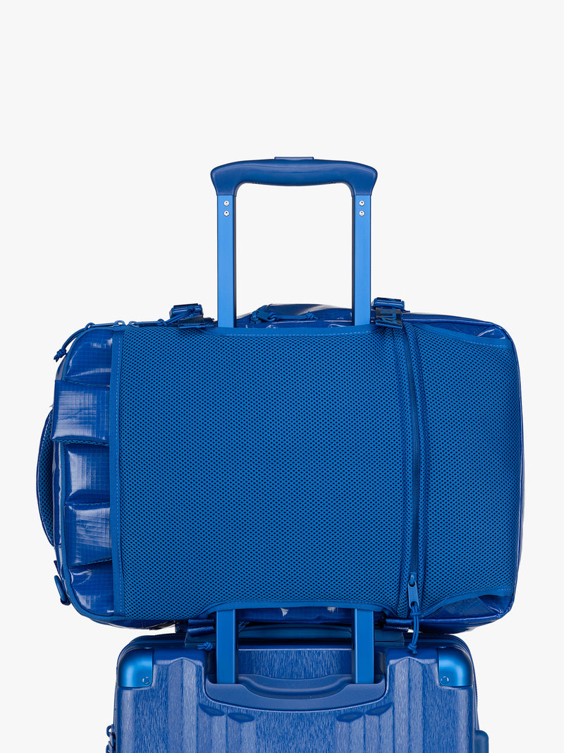 CALPAK Terra 26L Backpack Duffel in blue Cobalt back with trolley sleeve