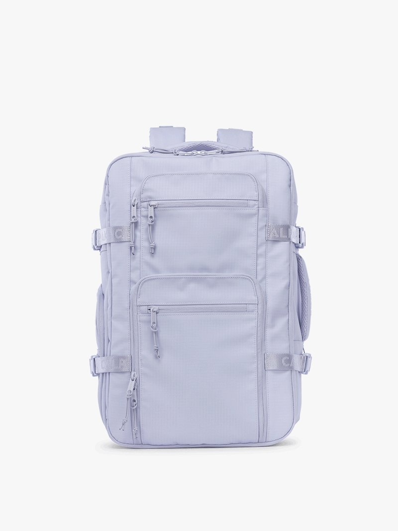 Gif showing front, back and sides of CALPAK Terra 26L Laptop Duffel Backpack with multiple pockets in light purple Sea Glass on a white background