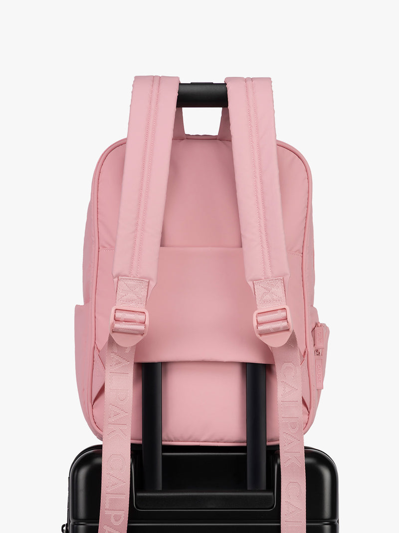 CALPAK Luka 15in Laptop Backpack in monochrome pink Blossom with trolley sleeve