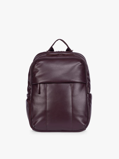 CALPAK Dark Cherry Luka 15 inch Laptop Backpack in vegan leather with a glossy finish, featuring a top carry handle, a main zippered compartment, and a front slip pocket, shown against a plain white background; BPL2001-DARK-CHERRY-PU view 1